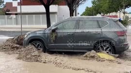 Muddy floodwater gushes through streets of Zaragoza after hailstorm