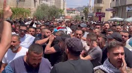 Mourners attend the funeral of Khairi Shaheen and Hamza Maqbul, killed by Israeli forces during a military raid, in Nablus in the occupied West Bank