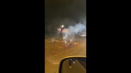 Car Avoids Fireworks But Not Pole