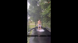 Boy's wet 'n' wild trampoline adventure ends on a slip-endous note