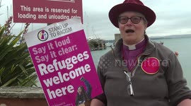Activists protest against barge that will home refugees that is set to arrive at Portland