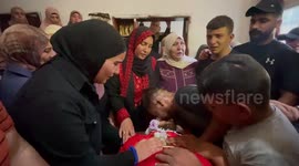 Mourners carry the body of 24-year-old Palestinian Abdel Jawad Hamdan Saleh, killed a day earlier during a demonstration against Israeli settlements in the village of Umm Safa, during his funeral in the West Bank town of Arora north of Ramallah.