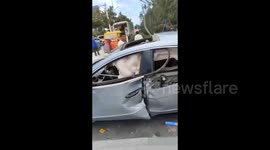 Motorist narrowly escapes serious injuries as car suddenly explodes amidst China's heatwave