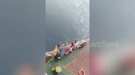 Vietnamese fisherman floating in sea rescued by passing ship