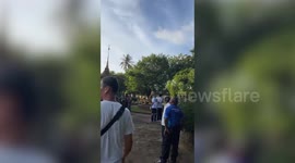 Russian tourist leaps to his death while climbing Buddhist temple pagoda in Thailand