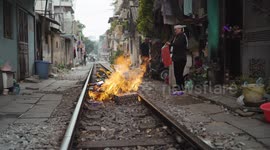People burn joss paper in Hanoi, Vietnam