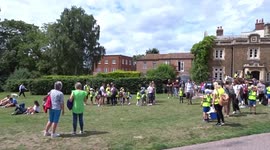 People gathered in Windsor Great Park waiting for Joe Biden to arrive by helicopter