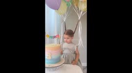 Balloons, cake, and joy: little Alice celebrates her third birthday