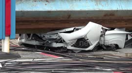 Rescue teams remove rubble from overpass collapse that killed two in Bangkok, Thailand