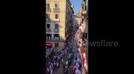 US family runs with the bulls during famous Pamplona festival