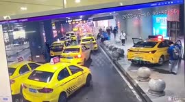 Out-of-control taxi ploughs onto sidewalk injuring two in China