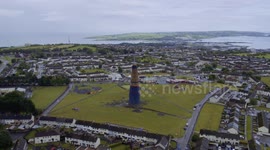 Take a look at the 'world's tallest' bonfire that towers over buildings in Northern Ireland