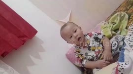 Laughing Off 1 Year Old Toddler While Joking With His Mother In Padang City, West Sumatra