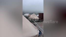High winds blow through tents at campsite in northern Thailand