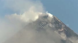 Mayon Volcano releases clouds of smoke and ash in the Philippines
