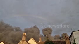 UK: Rainbow Appears Above Smoke From Baldock Industrial Estate Fire