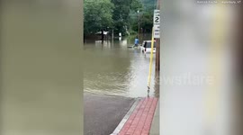 Video shows residents using kayaks after torrential rain brought widespread flooding to Vermont
