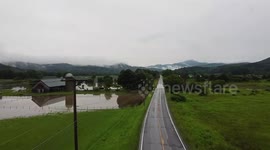 Aerial footage shows catastrophic flood engulfing field in Vermont, USA