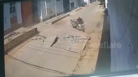 Three-wheeler rider narrowly avoids road explosion due to heatwave in China