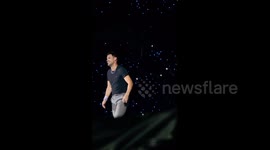 Taylor Lautner backflips across stage at Taylor Swift tour in Kansas City