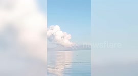Taal volcano continues to spew thick white gas as it remains on alert level in the Philippines
