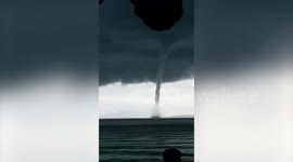 Huge waterspout tornado churns up the sea of the Philippines coast