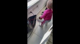 Baby Tries to Eat From Dog Bowl