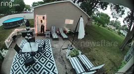 Woman narrowly escapes death as tree violently snaps outside house in Indiana, US