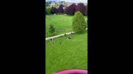 View from a balloon basket as it rises from Victoria Park, Bath towards The Royal Crescent