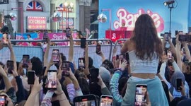 Hundreds of ticketless Barbie fans in Leicester Square try to catch a glimpse of their favourite stars
