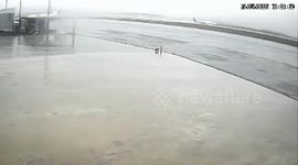 Plane skids off wet runway and plunges through hard shoulder while landing in Brazil
