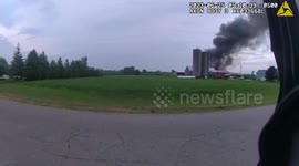 Hero policeman rescues three cows stuck inside burning barn in Wisconsin