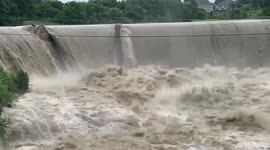 River Raging with Overflow After Heavy Rainfall Hit Essex Junction, VT, USA