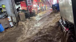 Floods ravage famous night market as heavy rainfall hits northern China