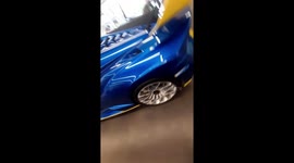 LAMBORGHINI HURICAN  with Racing colours parked in the showroom, exclusive