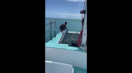 Man Does Backflip Off of Boat Going Over Big Wave