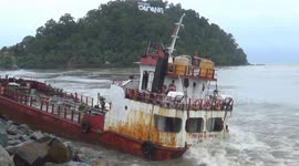 Extreme weather leaves fuel boats stranded on rocky beach in Indonesia