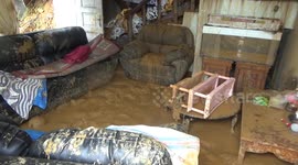 Houses invaded by mud amid severe floods and landslides in Indonesia