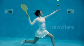STUNNING images of past Team GB swimmer Rebecca Richardson swooshing some tennis shots underwater have been captured in a quirky homage to Wimbledon.