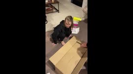 Girl becomes frenzied with happiness after dad surprises her with an electric skateboard after having lowered her expectations