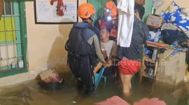 Two elderly people rescued from Indonesia floods after having strokes