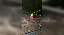 Rescue officials save six people trapped due to river overflow in Himachal Pradesh, India