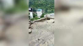 Part of bridge collapses due to heavy rainfall in Hatkoti, Himachal Pradesh, India