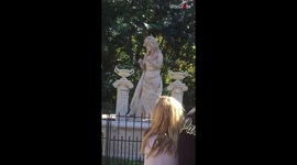 Living statue performer mesmerizing people in the Busch Gardens, Tampa