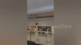 Shopping mall ceiling collapses as tropical storm Talim batters the Philippines