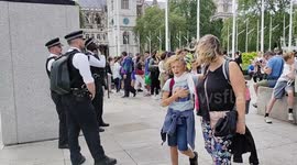 Police filming Just Stop Oil protestor, London, UK