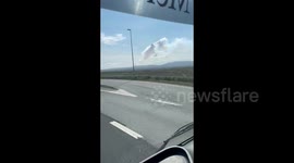 Car passenger captures Iceland volcano eruption