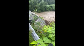 Astonishing footage of Vermont's vicious floodwaters destroying shipping container
