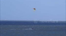 Lone 'daredevil' kitesurfer seen out in 50mph winds off Kent, UK
