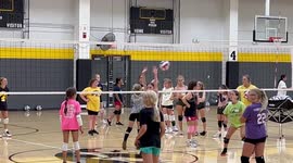 Girls volleyball practice ends up with all net in basketball hoop
